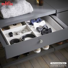 an open drawer with several items in it