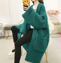 Long Acrylic Outerwear For Winter, Long Knitted Acrylic Outerwear, Trendy Green Cardigan, Oversized Long Acrylic Outerwear, Trendy Green Acrylic Outerwear, Trendy Winter Cardigan In Solid Color, Long Cotton Sweater Coat For Winter, Trendy Solid Color Winter Cardigan, Green Knitted Fall Cardigan