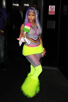 a woman in neon green and pink outfit