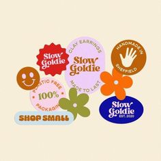 some stickers that say slow goldie and show small flowers