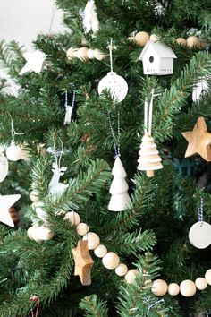 a christmas tree with ornaments hanging from it