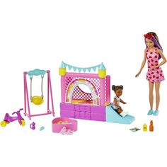 a barbie doll plays with her toys in the playroom, including a swing set and swings