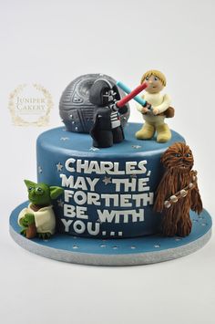 a star wars themed birthday cake with characters