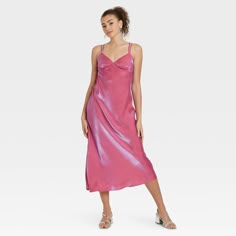 Sleeveless maxi slip dress from Wild Fable™ in a solid color with an iridescent finish. Features a V-neckline with triangle cups, double-string spaghetti straps with buckles for adjustability and a back zipper closure. Made from soft, lightweight satin fabric with rayon lining for comfortable all-day wear. If you're not satisfied with any Target Owned Brand item, return it within one year with a receipt for an exchange or a refund. Wild Fable™: A look for every story. Glamorous Bias Cut Slip Dress For Summer, Glamorous Summer Slip Dress, Pink Slip Dress With Adjustable Straps For Night Out, Glamorous Pink Slip Dress For Spring, Spring Evening Strappy Slip Dress, Glamorous Pink Slip Dress For Summer, Pink Slip Dress With Adjustable Straps For Date Night, Spring Party Slip Dress With Adjustable Straps, Spring Evening Slip Dress With Straps