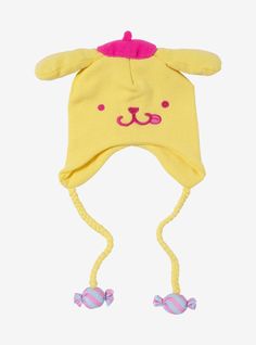 a child's yellow hat with pink ears