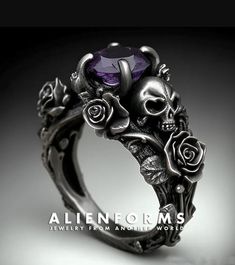 ♦ Gothic skulls engagement ring. Made in sterling silver, set with purple amethyst center stone ♦ Made to order ♦ Available in all ring sizes ♦ Comes in an elegant ring box  ♦ Designed and Handcrafted in house Gothic Rings Wedding, Engagement Rings Gothic, Halloween Engagement Ring, Vampire Wedding Ring, Emo Wedding Rings, Wedding Ring Purple, Black Stone Wedding Ring, Gothic Promise Rings, Unique Skull Shaped Anniversary Rings