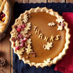 a thanksgiving pie with the words thanks written on it