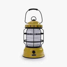 a yellow and black lantern on a white background