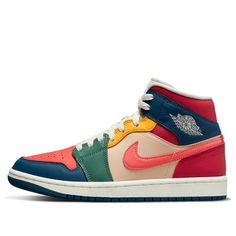 Are you ready to make a statement in the Air Jordan 1 Mid SE Womens Multi Color Silhouette? This standout footwear is designed to turn heads. Featuring creamy-colored layered tongue and midfoot components, accentuated with a multicolored rainbow of vibrant colors, this silhouette is a sight to behold. The ankle section boosts patriotic red, white, and blue elements, while toe boxes introduce crimson tones, allowing navy accents to stand out along the forefoot strip. Celebrate your uniquely stylish look with the Jumpman emblem atop a white midsole and navy outsole – it’s time to live life in brilliant color. Get noticed with the Air Jordan 1 Mid SE Womens Multi Color 2022 Silhouette. (AJ1/SNKR/Retro/Mid Top/Women's/Leather/Basketball) Modern Multicolor High-top Custom Sneakers, Multicolor High-top Sneakers With Cushioned Footbed For Streetwear, Multicolor High-top Custom Sneakers With Cushioned Footbed, Multicolor High-top Sneakers With Cushioned Footbed, Colorful Jordan 1, Colorful Jordans, Cool Nikes, Wmns Air Jordan 1, Sneaker Outfits Women