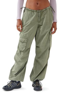 Bungee cords at the waist and cuffs let you adjust the fit of roomy cotton cargo joggers equipped with a mix of utility pockets. Exclusive retailer 30 1/2" inseam; 20" leg opening; 9 1/2" front rise; 15 1/2" back rise (size Medium) 100% cotton Machine wash, line dry Made in Turkey