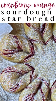 cranberry orange sourdough star bread with powdered sugar on the top