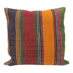 a colorful striped pillow on a white background