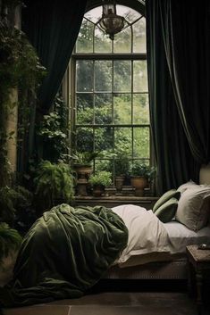 an image of a bedroom setting with plants in the window and on the bed looking out