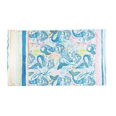 a blue and white scarf with an image of mermaids on the front, in different colors