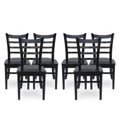 a set of six black dining chairs