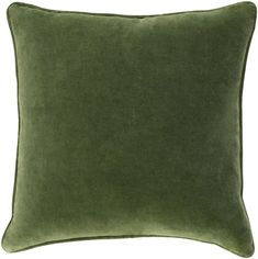 a green pillow on a white background