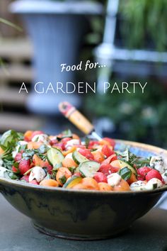 a bowl full of vegetables with the words food for garden party written in large letters