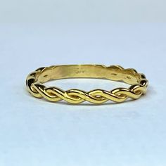 This 14-Karat Yellow Gold Ring Features A Dynamic Twisted Rope Look And Has A Sizing Bar That Makes It Easy To Size The Ring Up Or Down. The Ring Is An Ideal Design For Stacked Ring Arrangements. We Have Different Design Of A Variety Of Stackable Ring Styles To Mix And Match. Ring Width 2.55mm. Size 6-7.5 Match Ring, Strand Braid, Ring Styles, Braided Ring, Stackable Ring, Yellow Gold Ring, Ring Band, Stackable Rings, Womens Jewelry Rings