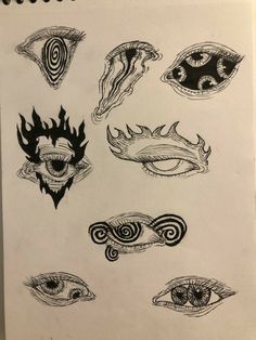 a drawing of different types of eyes and their designs on white paper with black ink