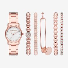 This elegant women's set in rose gold features a three-hand analog rose colored mop dial with glitz and a rose gold-tone metal bracelet. Completing the set are a rose gold tone and blush bracelet accessories.# Pieces In Set: 2Number of Batteries: 1Included: 1 Watch(es)Features: Quick ShipBattery Type: Lithium IonPower Source: Battery (included)Watch Movement: QuartzWater Resistance: 30mCase Thickness: 9mmWatch Band Length: 7 1/4 InchBand Content: Metal AlloyCase Materials: 100% Metal AlloyBattery Size: Sr626swBand Width: 18mmCare: Wipe CleanCountry of Origin: Imported Watch And Bracelets, Watch Set, Bracelet Accessories, Bracelets Set, Metal Bracelet, Soft Feminine, Women Rising, Skechers Women, Matching Bracelets