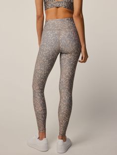 The Midas Wolf Luna Legging is constructed with luxurious Italian fabric that retains its shape while still providing plenty of stretch. Built with a high-waisted fit, this full-length legging is resistant to pilling and offers UV protection. Finished with the distinctive Greyson wolf on the back left leg, along with a wide waistband for superior support. Perfect for every activity, this legging was engineered to sculpt and define while delivering all-day performance. 34% Recycled Nylon | 35% Re Italian Fabric, Wide Waistband, Women's Leggings, Uv Protection, Full Length, High Waisted, Leggings, Fabric