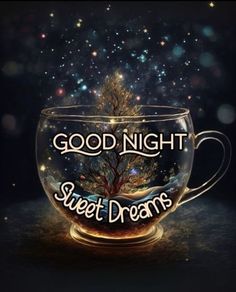 a coffee cup with the words good night sweet dreams written on it and a tree inside