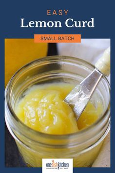 lemon curd in a glass jar with a spoon sticking out of it and the title overlay reads easy lemon curd small batch