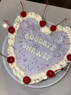 a heart shaped cake with the words goodbye shawty written on it