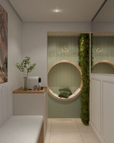 the interior of a spa with plants growing on the wall