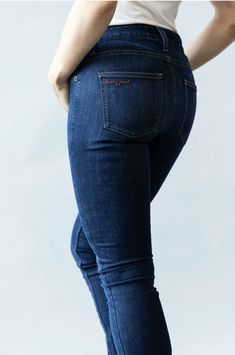 Our popular mid-rise meets a fitted thigh and modest flare bootcut in the Chloe. The dark wash tri-blend denim features hand-sanded details and a burgundy single rear pocket logo Fabric: 82% Cotton | 15% Polyester | 3% Elastane Fit: Mid-Rise, Fitted Thigh, Flare Bootcut Details: Hand sanding and single rear pocket logo. Construction: 11.5 Oz Denim Our jeans have the longevity and durability you demand because we only source ring-spun denim. Ring-spun denim has greater tensile/tear strength in th Kimes Ranch, Western Store, Western Jeans, Bootcut Jean, Pocket Logo, Western Hats, Sanding, Bootcut Jeans, Chloe