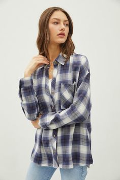 Introducing our Tatum Blue Flannel, a classic navy blue and charcoal brown plaid shirt. With a convenient button down design and a front single chest pocket, this flannel combines style and functionality. Stay warm and stylish this season with our Tatum Blue Flannel. 65% POLY 35% RAYON Women Flannel, Oversized Flannel, Blue Flannel, Classic Wardrobe Staples, Cozy Flannel, Classic Wardrobe, Be Cool, Brown Plaid, Flannel Fabric