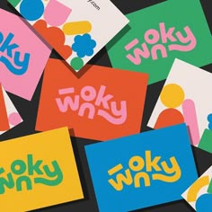 several different colored cards with the words wooky wny written on them in bright colors