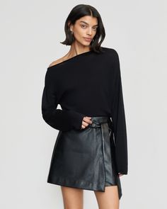 A mini skirt with a subtle edge in a soft vegan leather adds effortless polish to any wardrobe. Pair with everything from a black blouse in warmer weather to a chunky knit for a cozy look. See below for our general Size Guide and available measurements Self made of 100% polyurethane, lining made of 100% polyester Machine wash cold and lay flat to dry Versatile Black Skirt For Fall, Chic Asymmetrical Mini Skirt For Fall, Fall Mini Skirt In Sleek Style, Fall Sleek Mini Skirt, Sleek Fall Mini Skirt For Workwear, Sleek Mini Skirt For Night Out In Fall, Sleek Mini Skirt For Fall Night Out, Chic Relaxed Fall Mini Skirt, Edgy Skirt For Fall Workwear