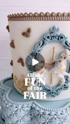 a blue and white cake with an image of a horse on it's side