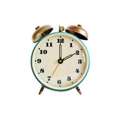 an alarm clock with two bells on the front and one at the top, against a white background