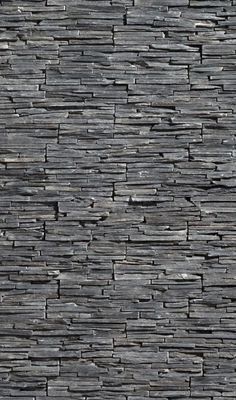 a close up view of a stone wall