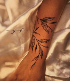 Olive Branch Tattoo Arm Wrap Stencil, Half Sleeve Vine Tattoos For Women, Forearm Tattoo Women Wrap Around, Vine Half Sleeve Tattoo, Leaves Wrapped Around Arm Tattoo, Wrap Around Leaf Tattoo, Wrap Around Bicep Tattoo Women, Leaf Sleeve Tattoo, Leaf Bracelet Tattoo