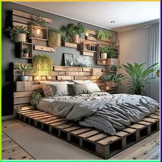 a bed made out of wooden pallets with plants on the headboard and pillows