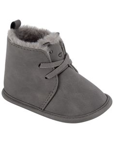 Designed with cozy sherpa on the inside and soft suede on the outside, these easy on boots are perfect for baby's growing feet.