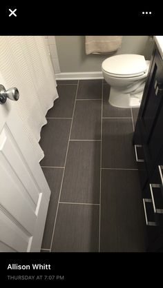 the bathroom is clean and ready to be used by someone in their home or business