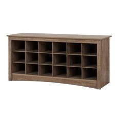 a large wooden shelf with many compartments