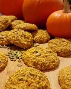 pumpkins and oatmeal cookies on a cutting board