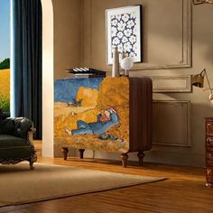 a living room filled with furniture and paintings on the wall next to a chair in front of a window