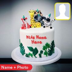 a birthday cake with an image of a giraffe, zebra, and other animals on it