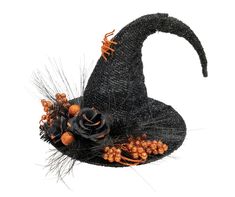 a black witches hat with orange flowers and feathers