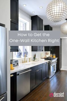 a kitchen with black cabinets and white counter tops, the words how to get the one - wall kitchen right