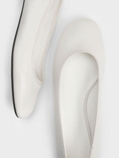 With their clean, sleek profile, these ballet flats are a stylish and versatile pair to add to your collection. The dainty style features ankle-accentuating straps that will provide a flattering and secure fit. In pristine white, they will brighten up your looks and go well with most colour palettes. Set on low block heels that will subtly elevate the frame, these flats are effortlessy chic and offer great style mileage. White Ballet Flats, Dainty Style, Brand Collaboration, Faux Leather Heels, Size Chart For Kids, Low Block Heels, Charles Keith, White Flats, Colour Palettes