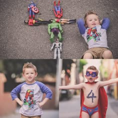 two boys wearing superhero costumes and one is holding his hands up in the air while another boy