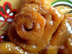 the doughnuts are covered with icing and ready to be eaten