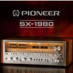 an old radio sitting on top of a table next to a sign that says pioneers sx - 1800